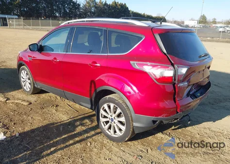 2017 Ford Escape Titanium z USA, uszkodzony, nr VIN 1FMCU9J93HUA07382